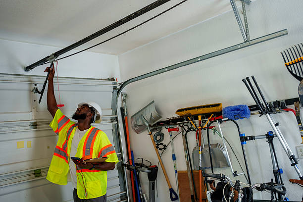 Professional Garage Door Panel Replacement technician working in Hanford, CA